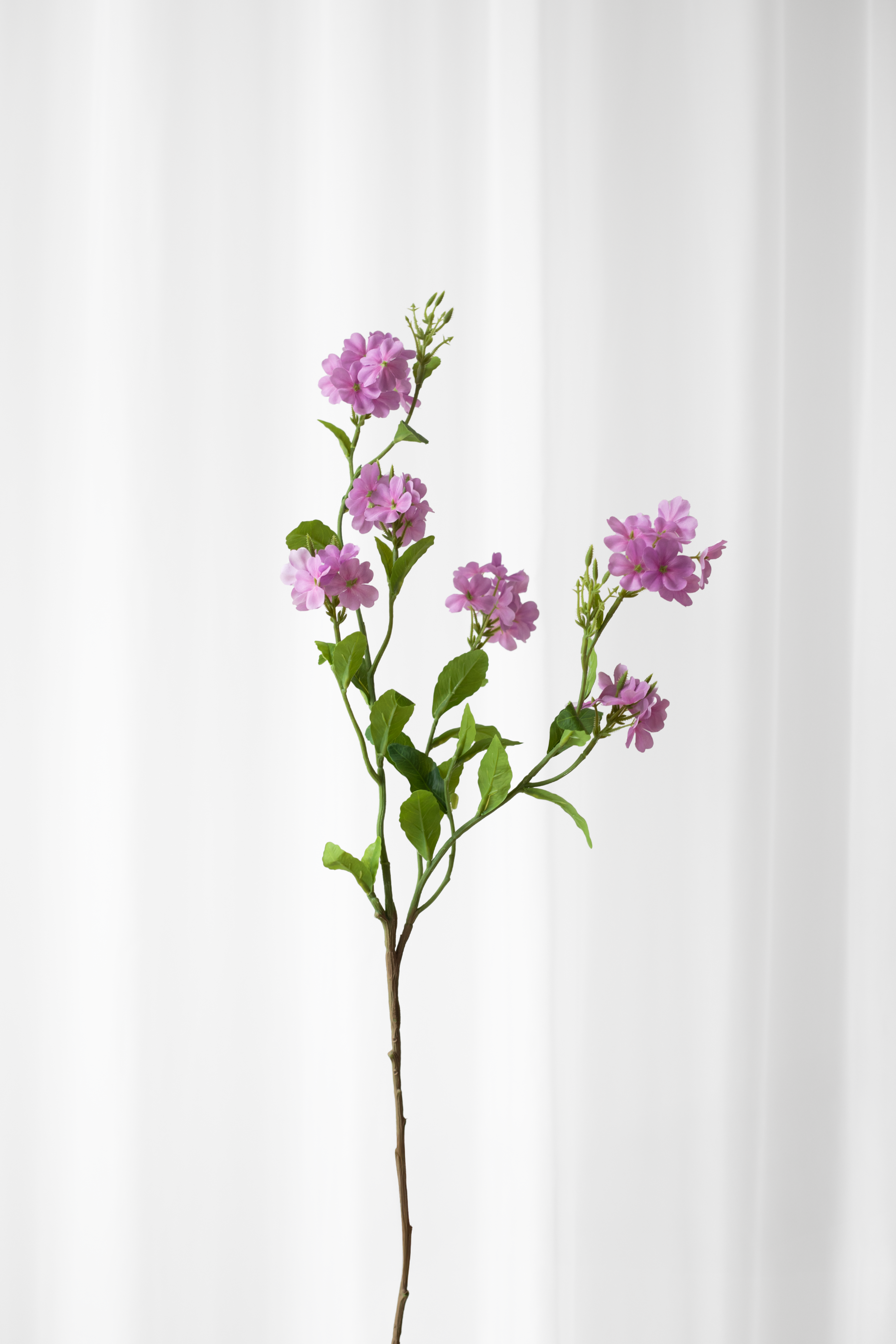 Kunstig fontensia blomst i mørkelilla